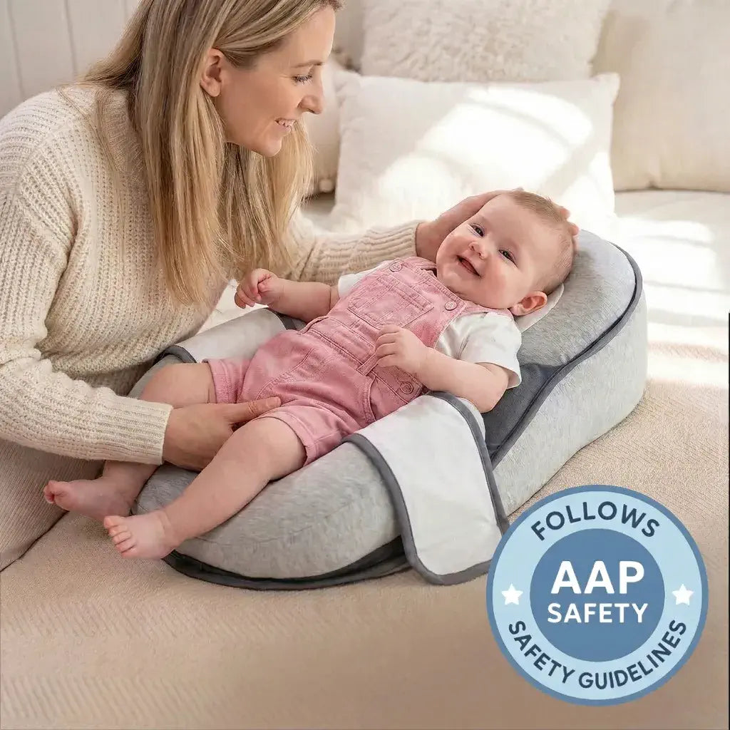 Baby lying on a cushioned seat with a woman, surrounded by safety guidelines badge.