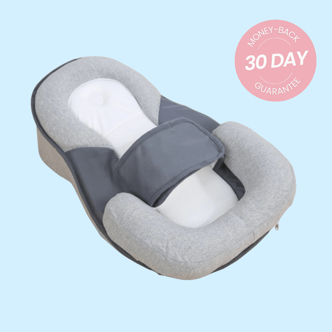 DreamNest baby bed with 30-day money-back guarantee badge.